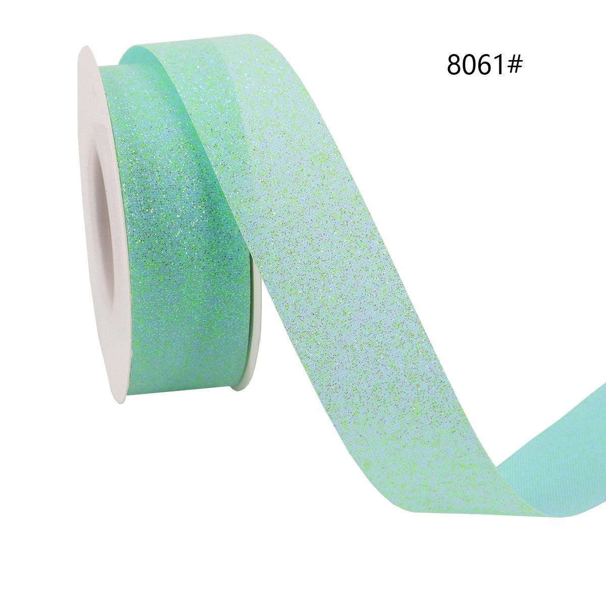 Light mint glitter ribbon on spool with glitter texture, for wrapping and bows