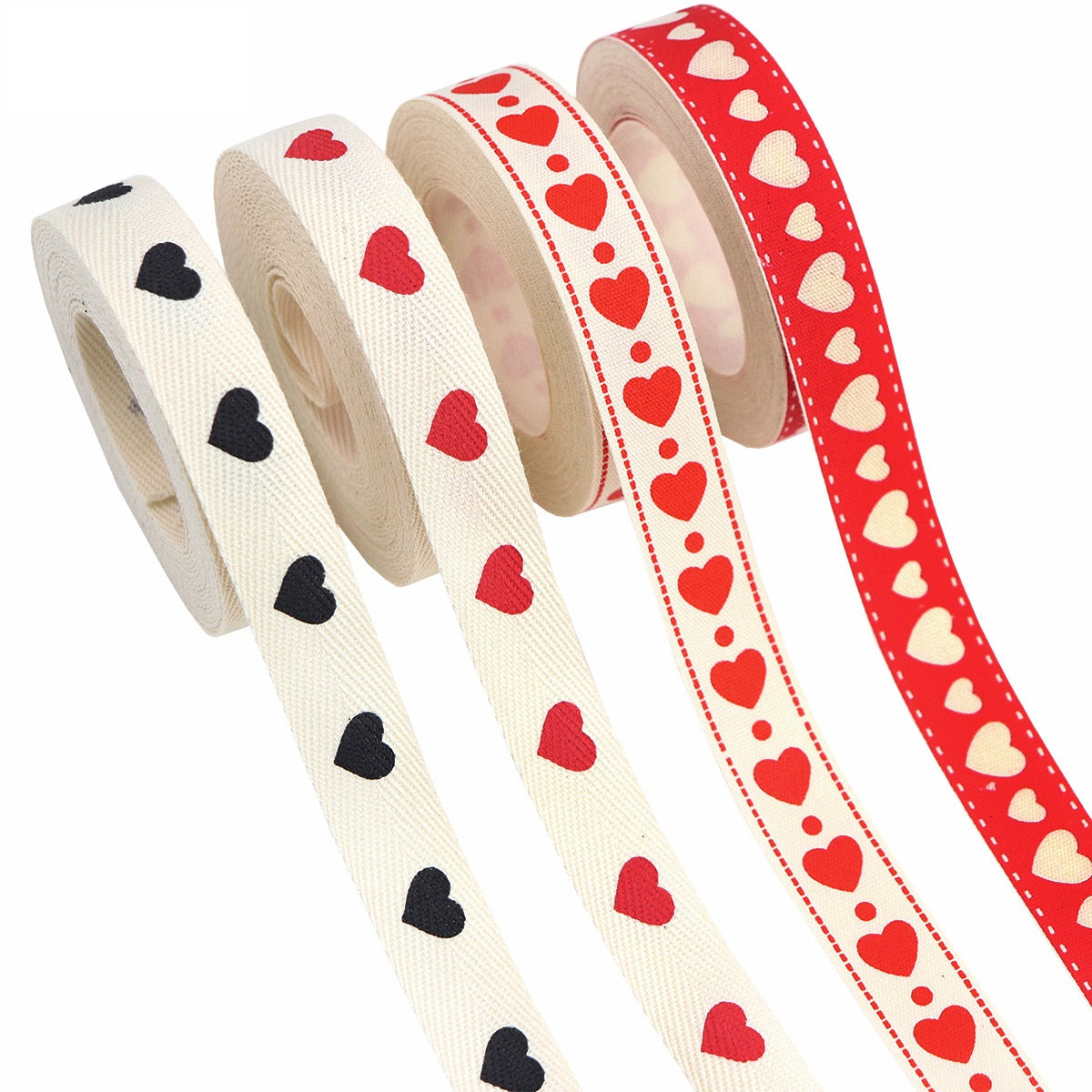 Cotton ribbon rolls with red and black hearts on cream