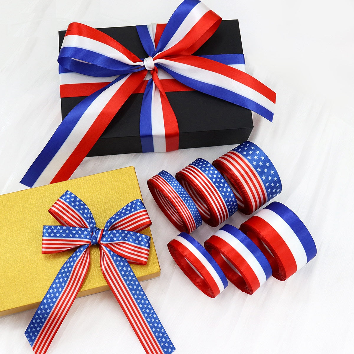 American flag ribbon set with red, white, blue stripes and star-pattern rolls