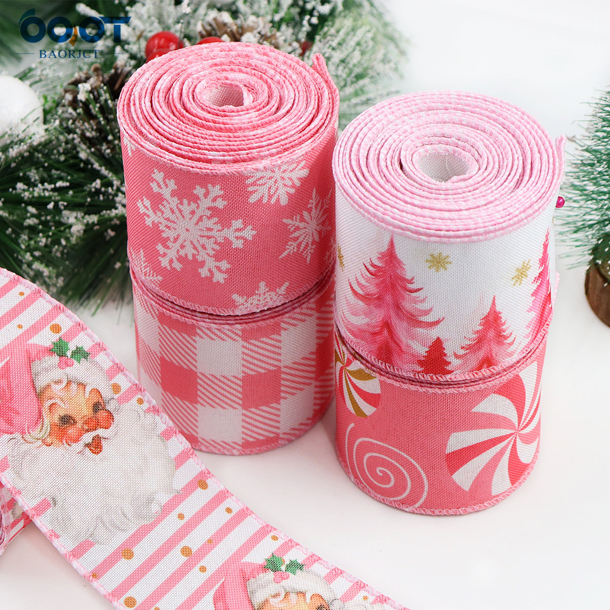 Pink Christmas wired hemming tape rolls with snowflake and tree print patterns