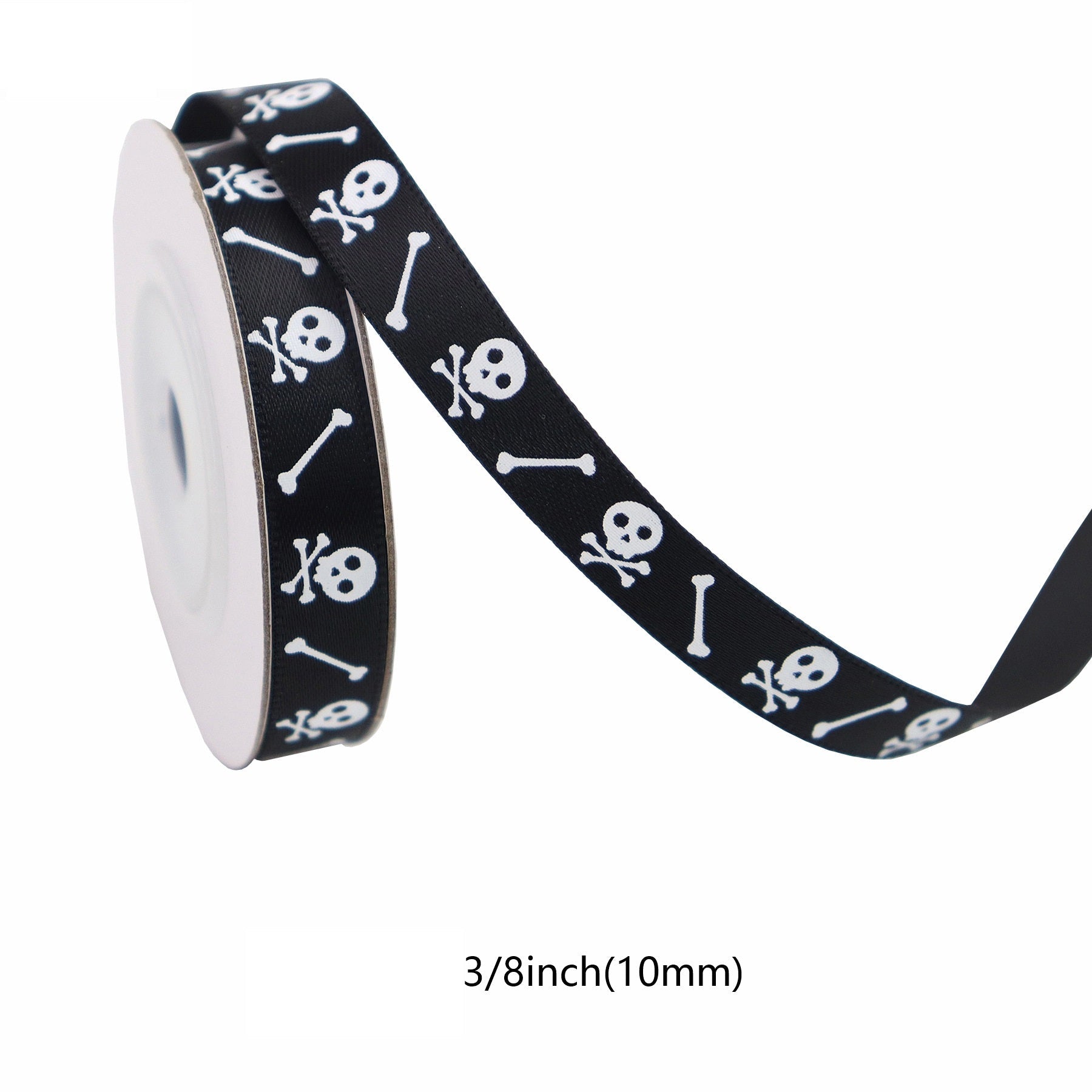 10mm Halloween ribbon: black base with white skull-and-bones print, roll view.