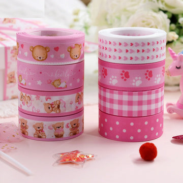 Pink 22mm ribbed ribbon roll with bear paw prints and hearts pattern