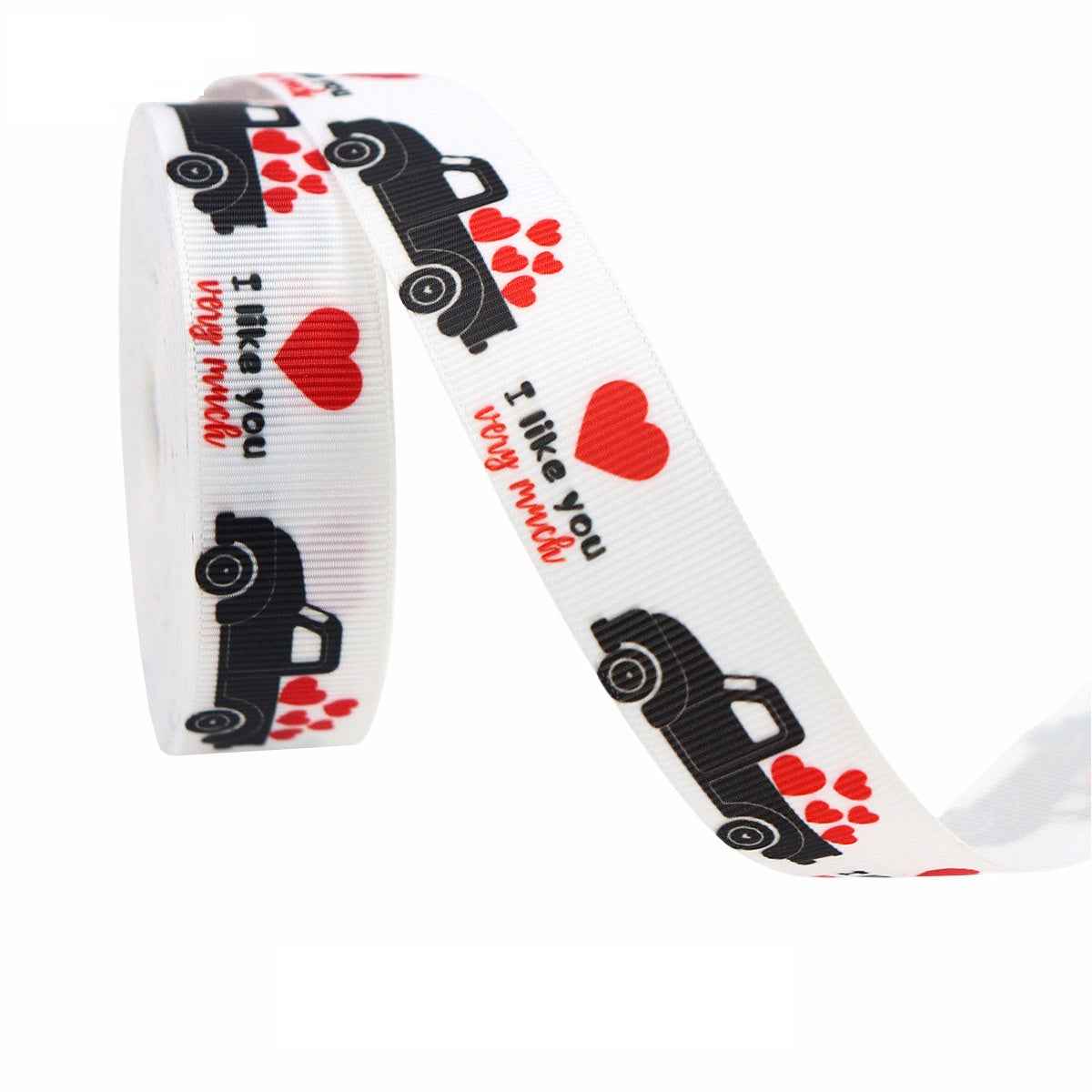 White ribbon with black dog images, red hearts, and red script text, Valentine roll