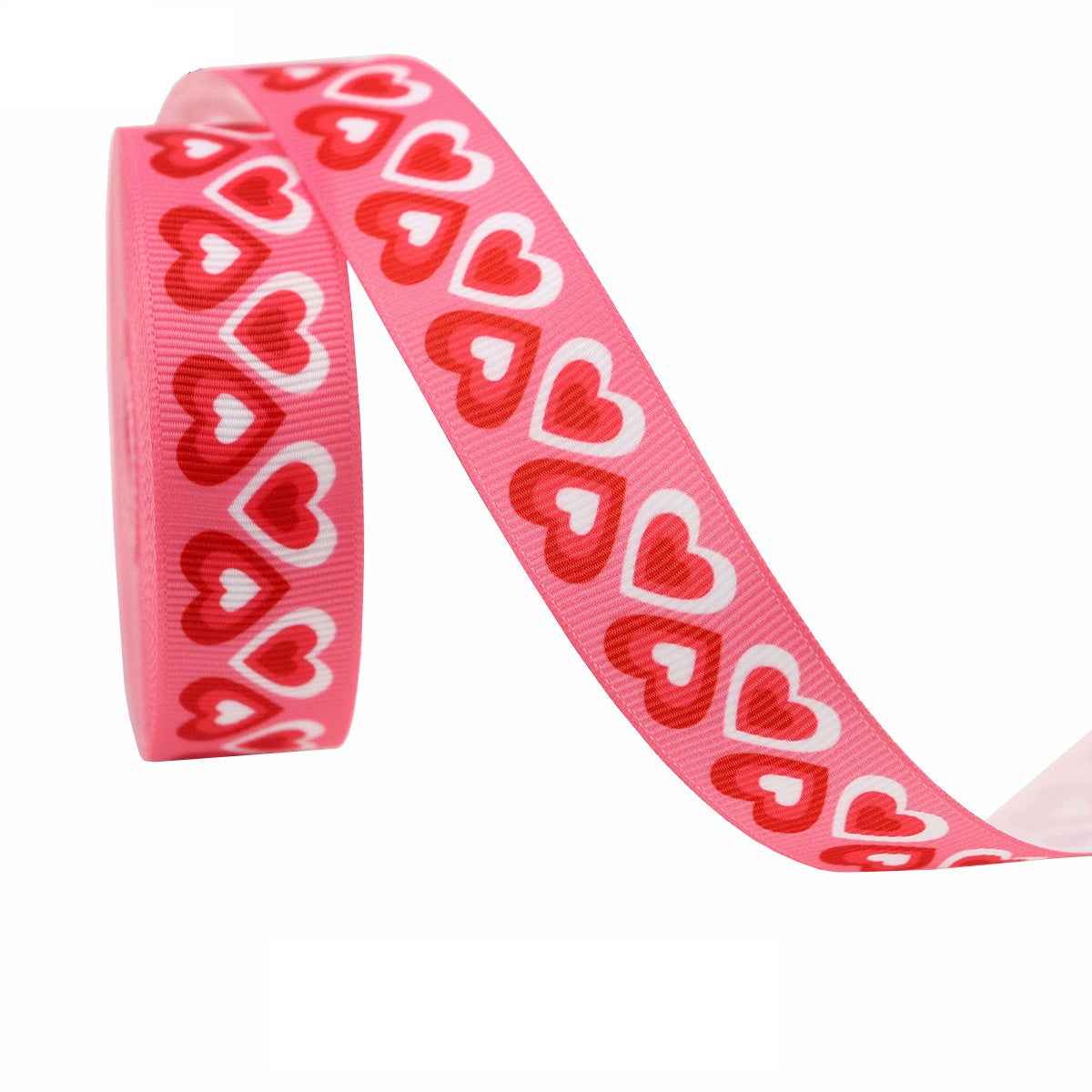 Pink Valentine ribbon with red and white heart shapes repeating, single roll