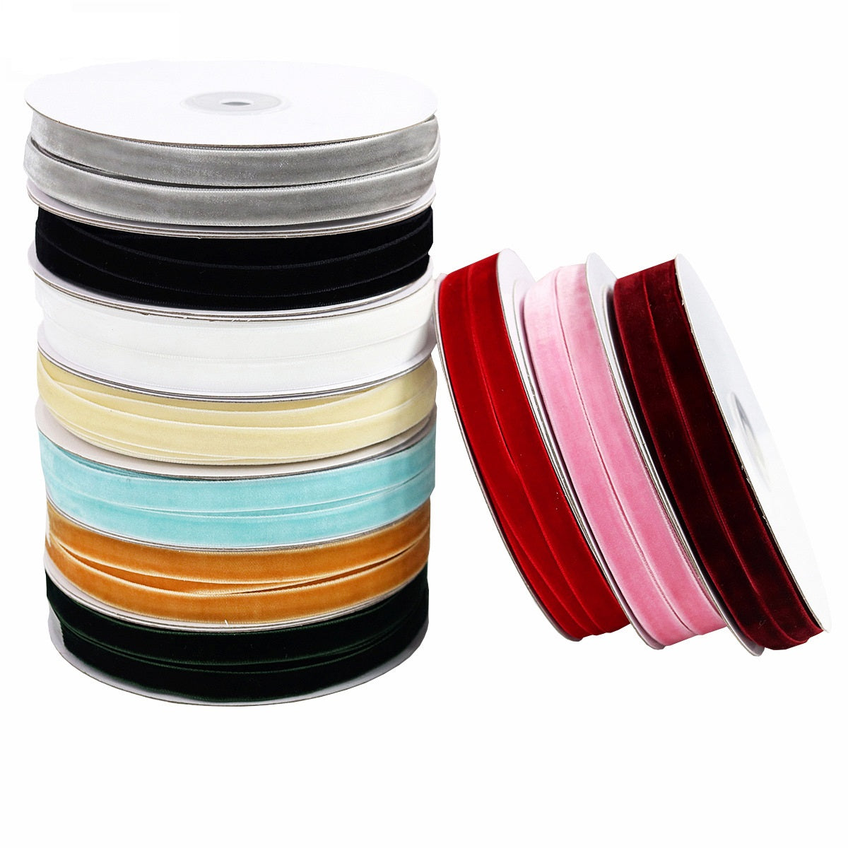 Stacked single-sided velvet ribbon rolls in silver, black, white, tan, red, pink, gold