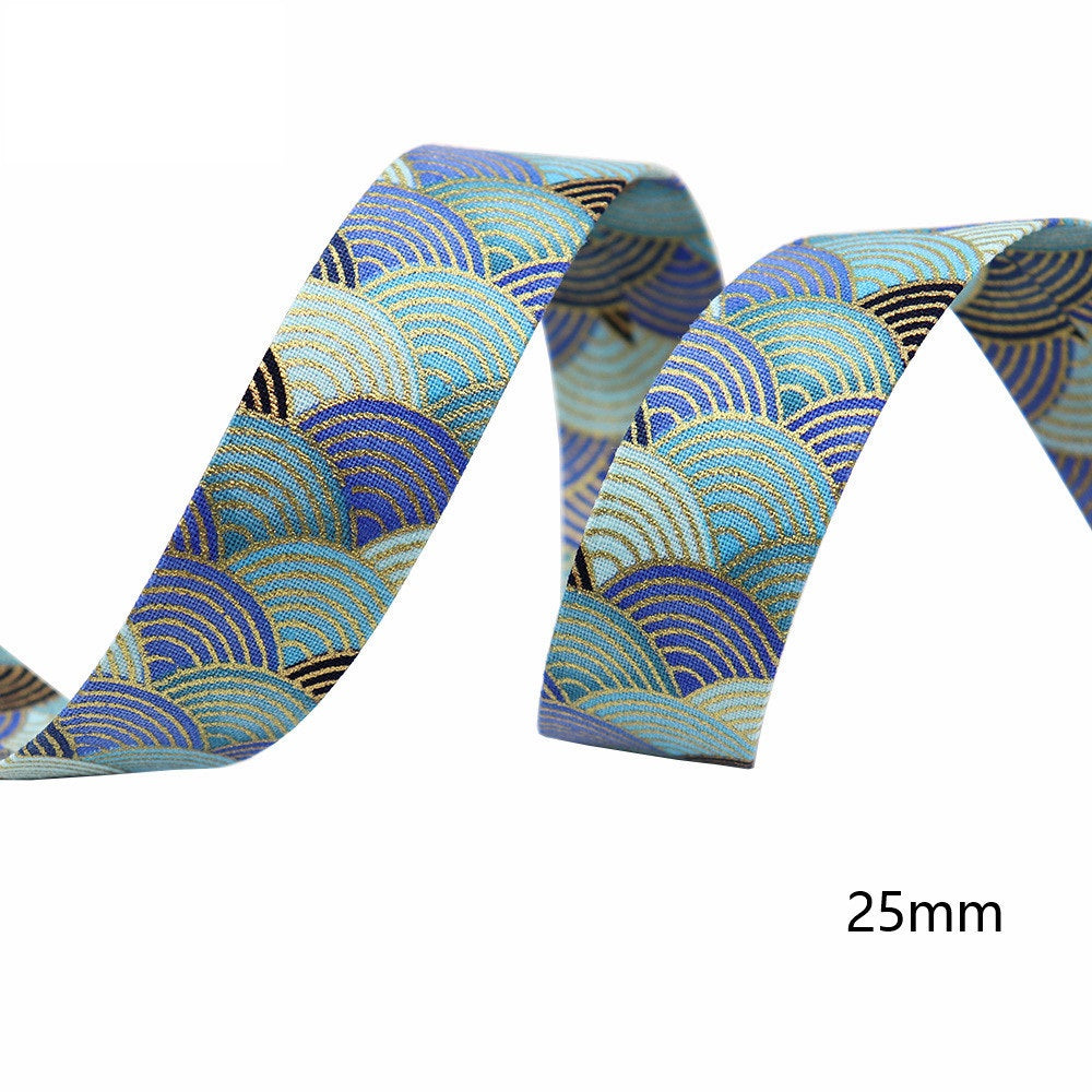 Sakura water ripple ribbon, 25mm width; blue wave arcs on light blue fabric.