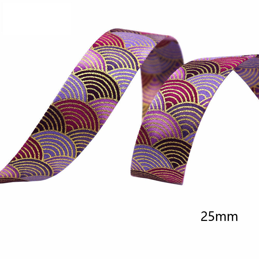 Sakura water ripple ribbon, 25mm width; purple fabric with gold wave arcs.