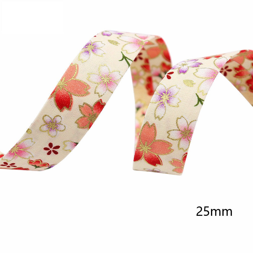 Sakura water ripple ribbon, 25mm width; cream fabric with small red-pink flowers.
