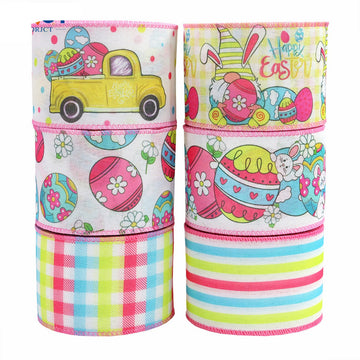 Pink wired Easter ribbon rolls with bunny, eggs, and patchwork patterns
