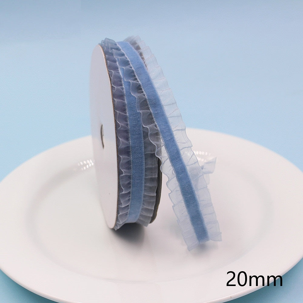 20mm light blue lace-edge elastic ribbon, ruffled lace trim on a spool
