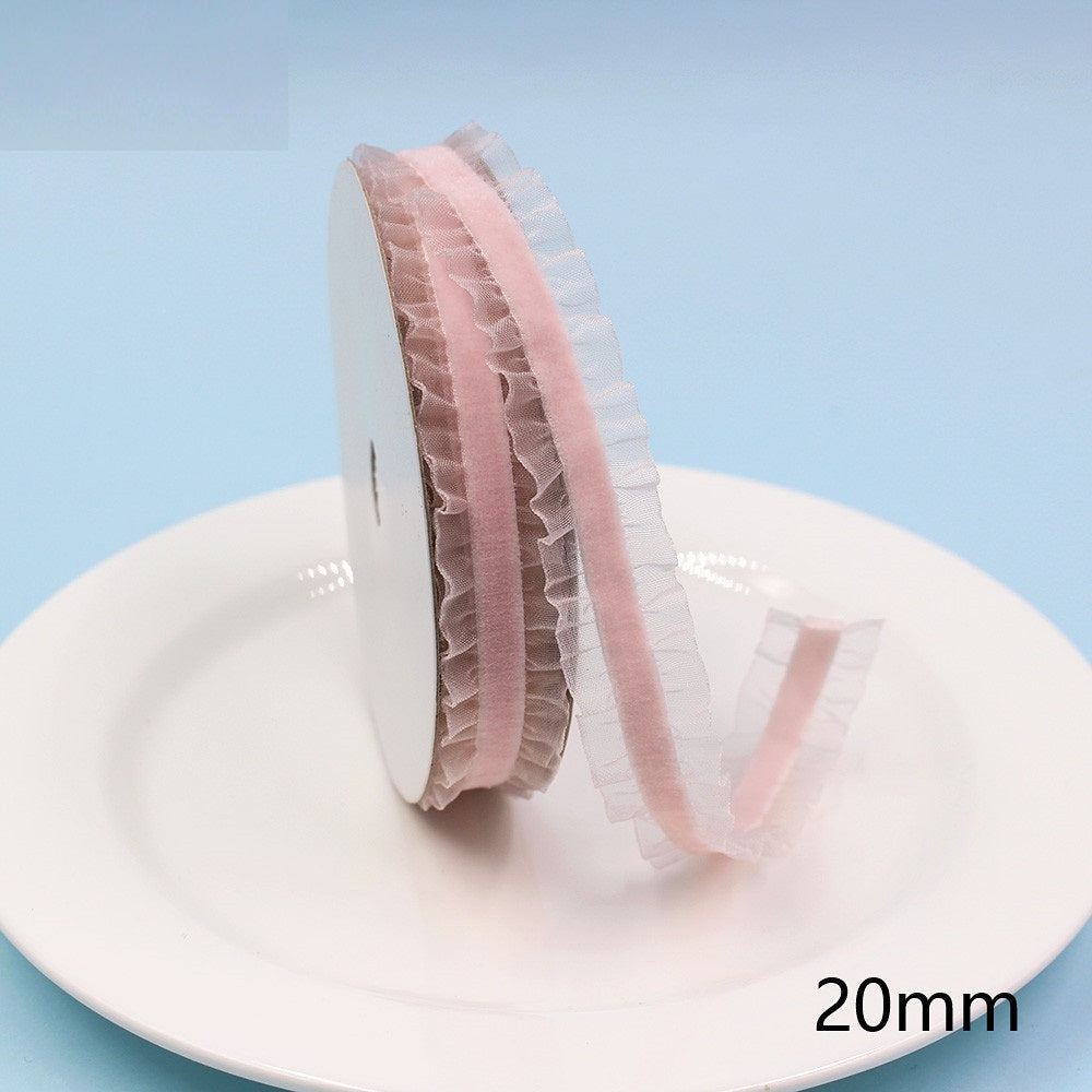 20mm blush pink lace-edge elastic ribbon, ruffled lace trim on a spool