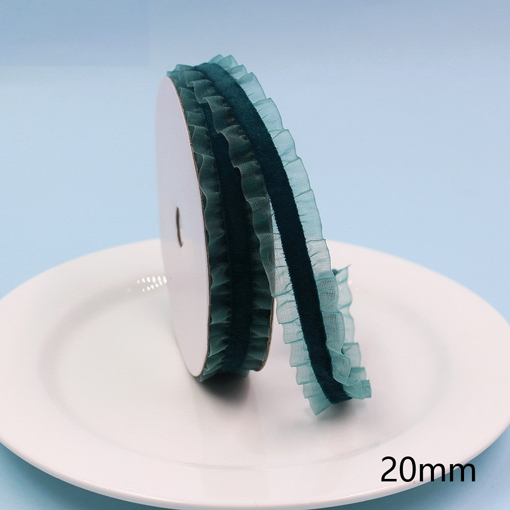 20mm dark green lace-edge elastic ribbon, ruffled lace trim on a spool