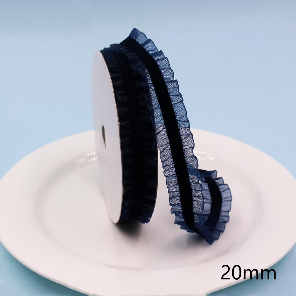 20mm dark blue lace-edge elastic ribbon, ruffled lace trim on a spool