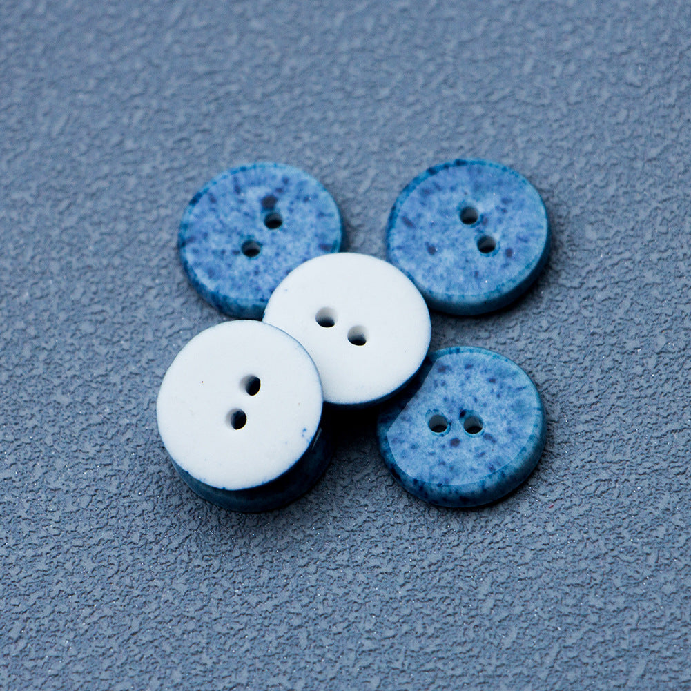 Round ceramic buttons: deep blue and light colors, each with two holes