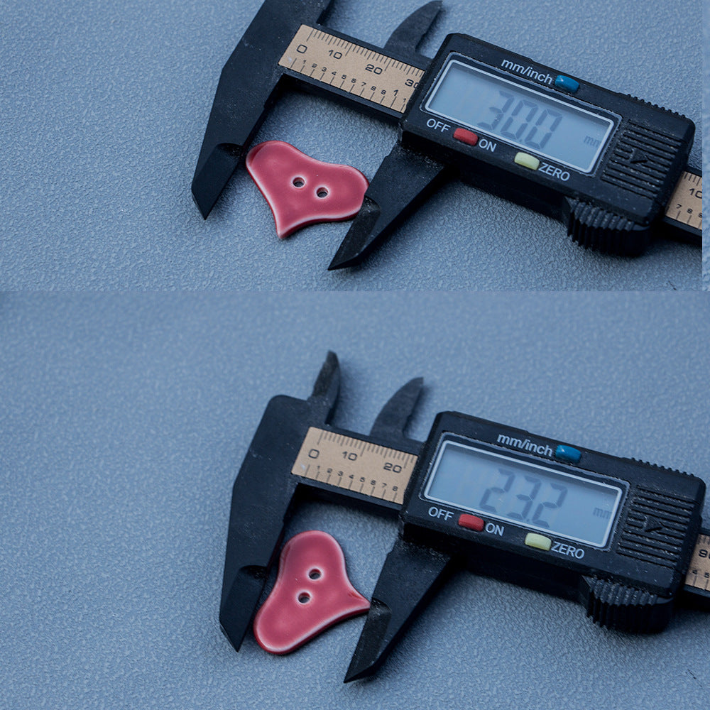 30 mm red heart ceramic button with 2 holes, measured with caliper