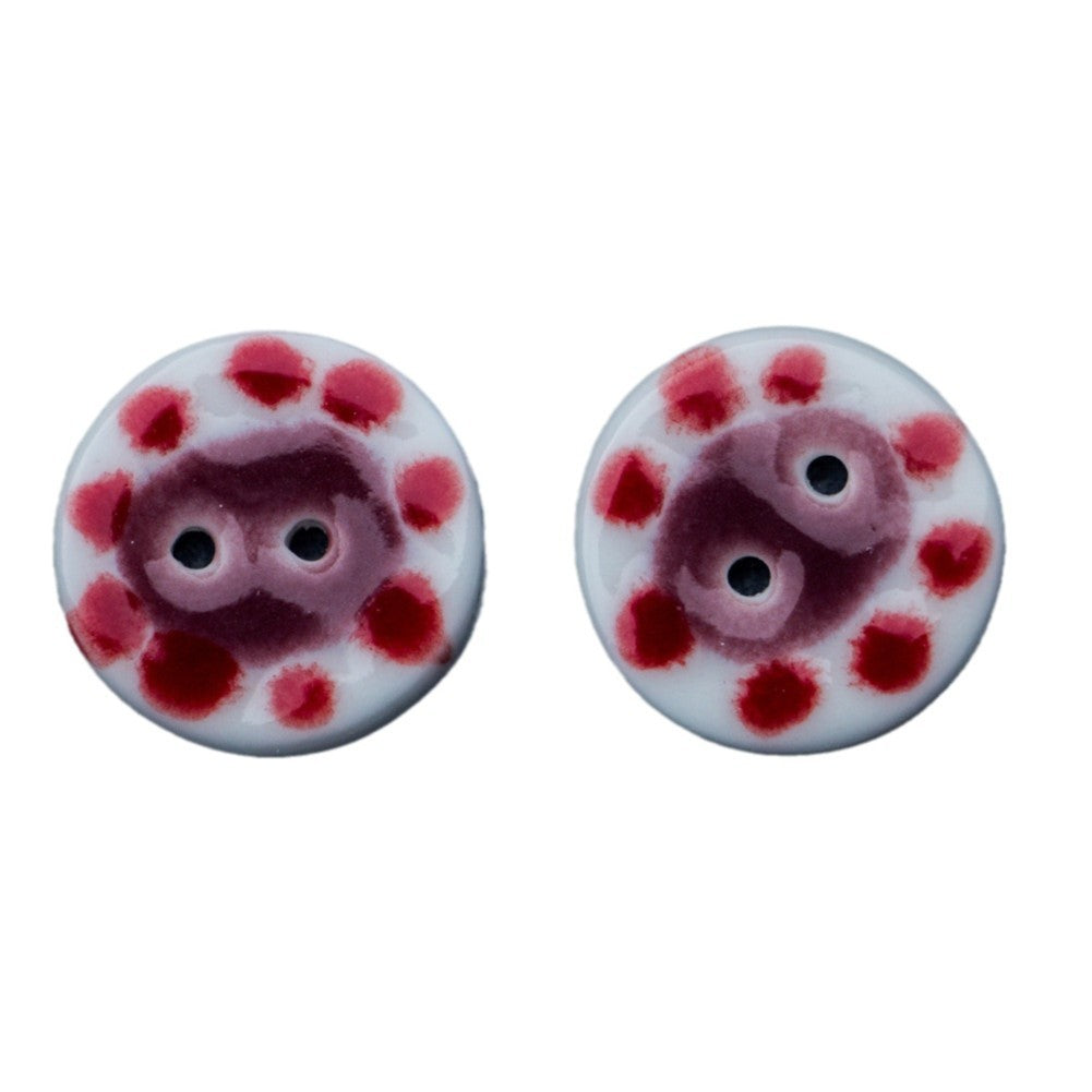 Handmade round ceramic buttons with red-dotted pig design; 2 holes