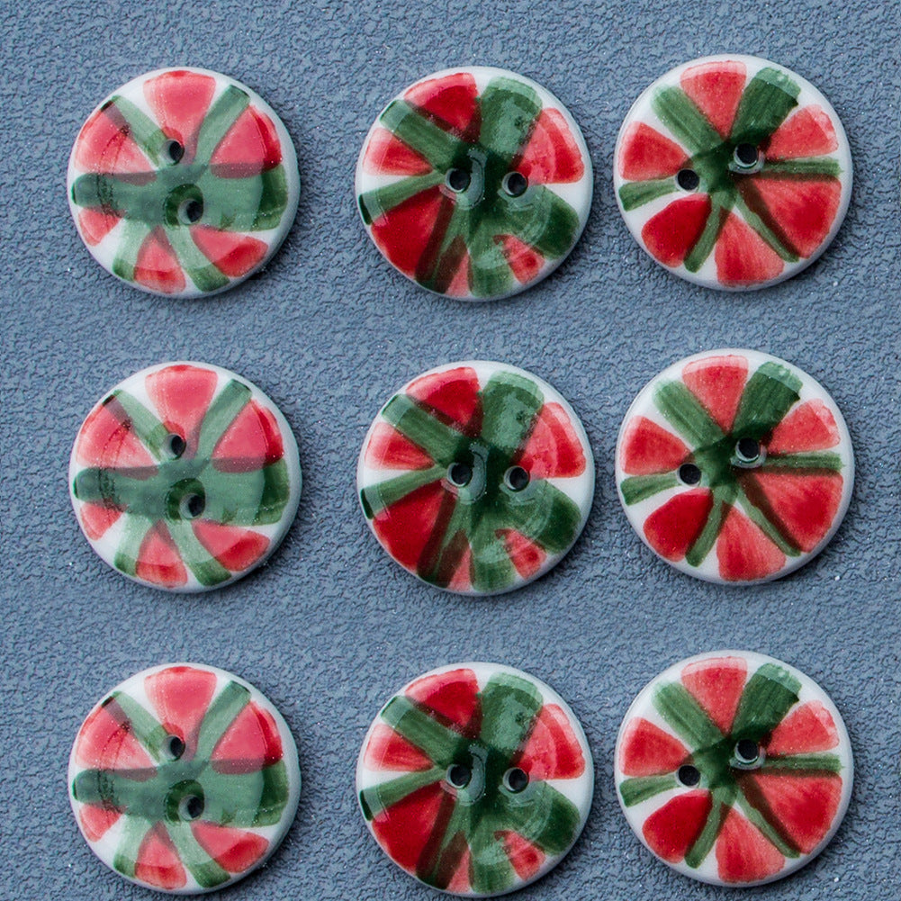 Set of red-and-green watermelon ceramic buttons, round, two-hole front view