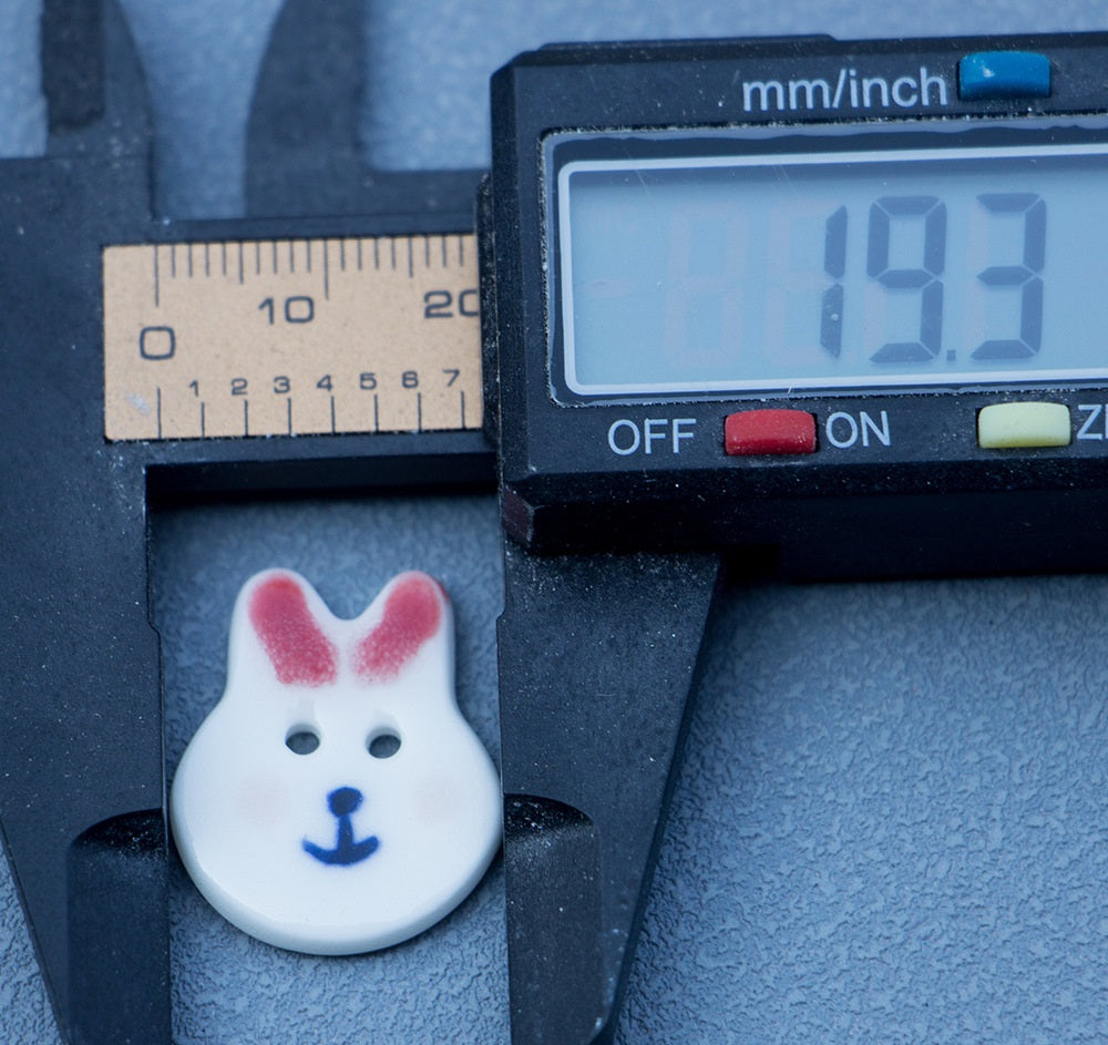 Rabbit ceramic button, 2-hole, red/pink ears with anchor face, 19mm