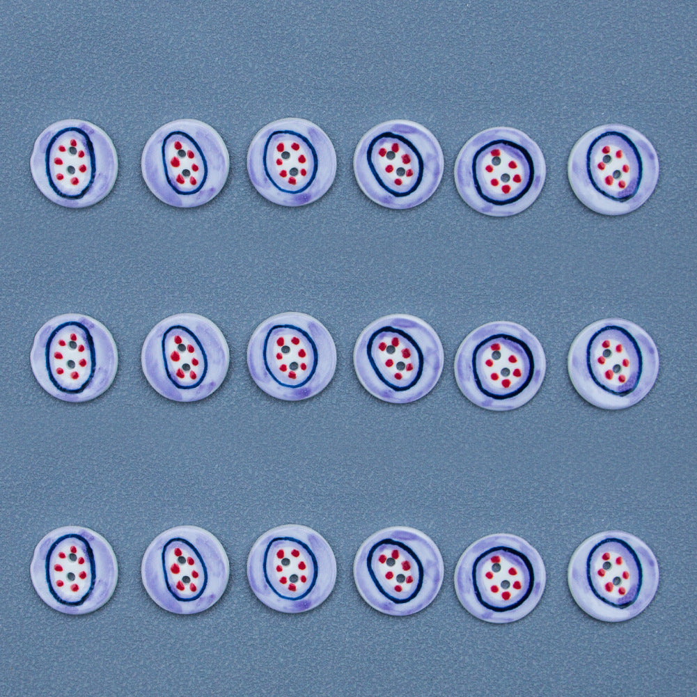 2-hole porcelain buttons, light purple with blue ring and red dot cherry motif
