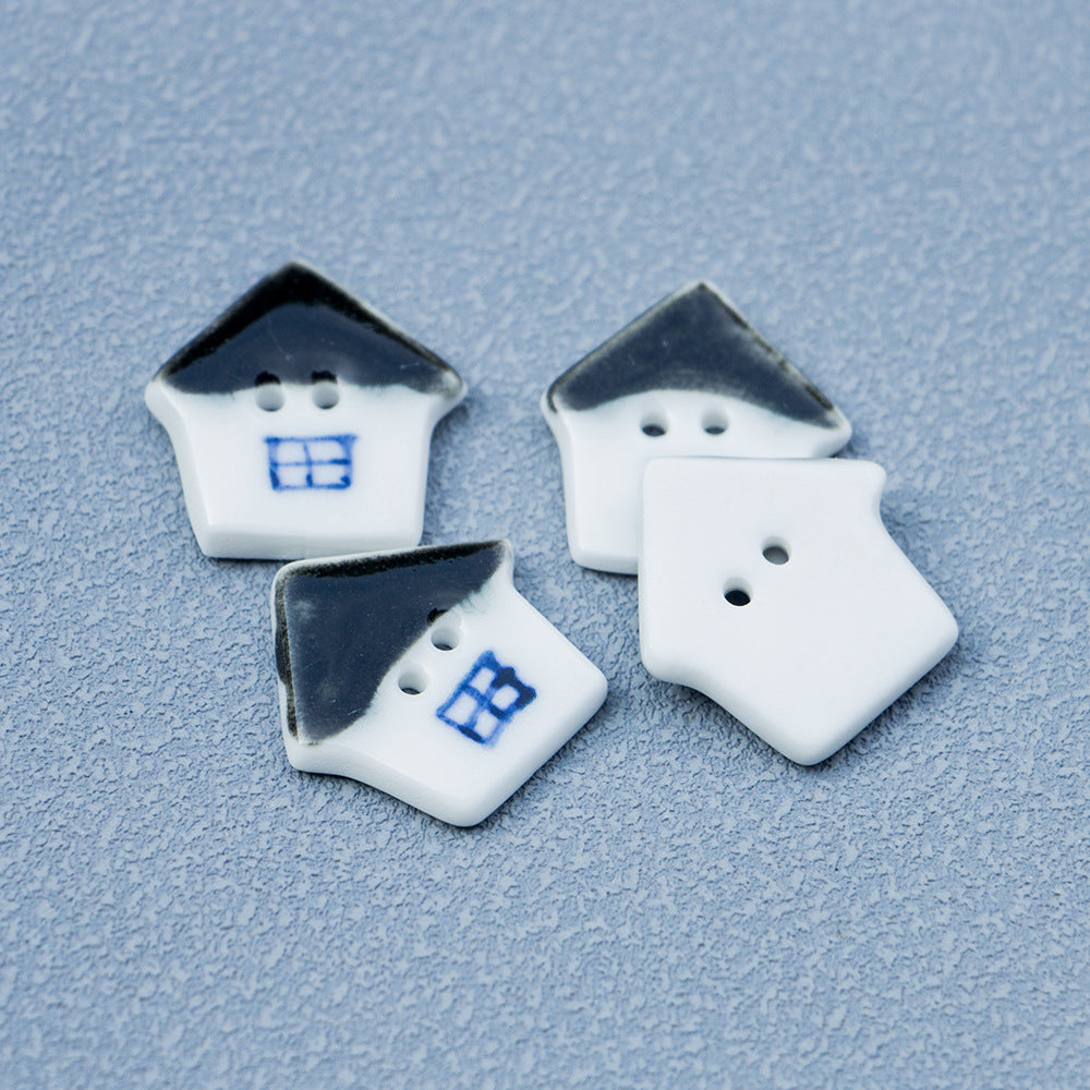 Ceramic house buttons, black-and-white two-hole painted design (10 pcs)