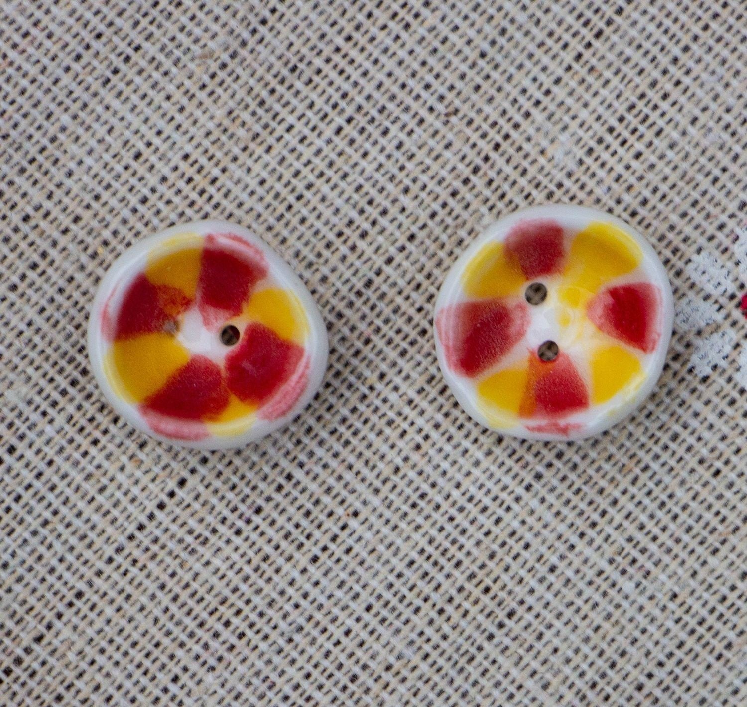 Handmade ceramic bowl-shaped 2-hole buttons, red and yellow flower design