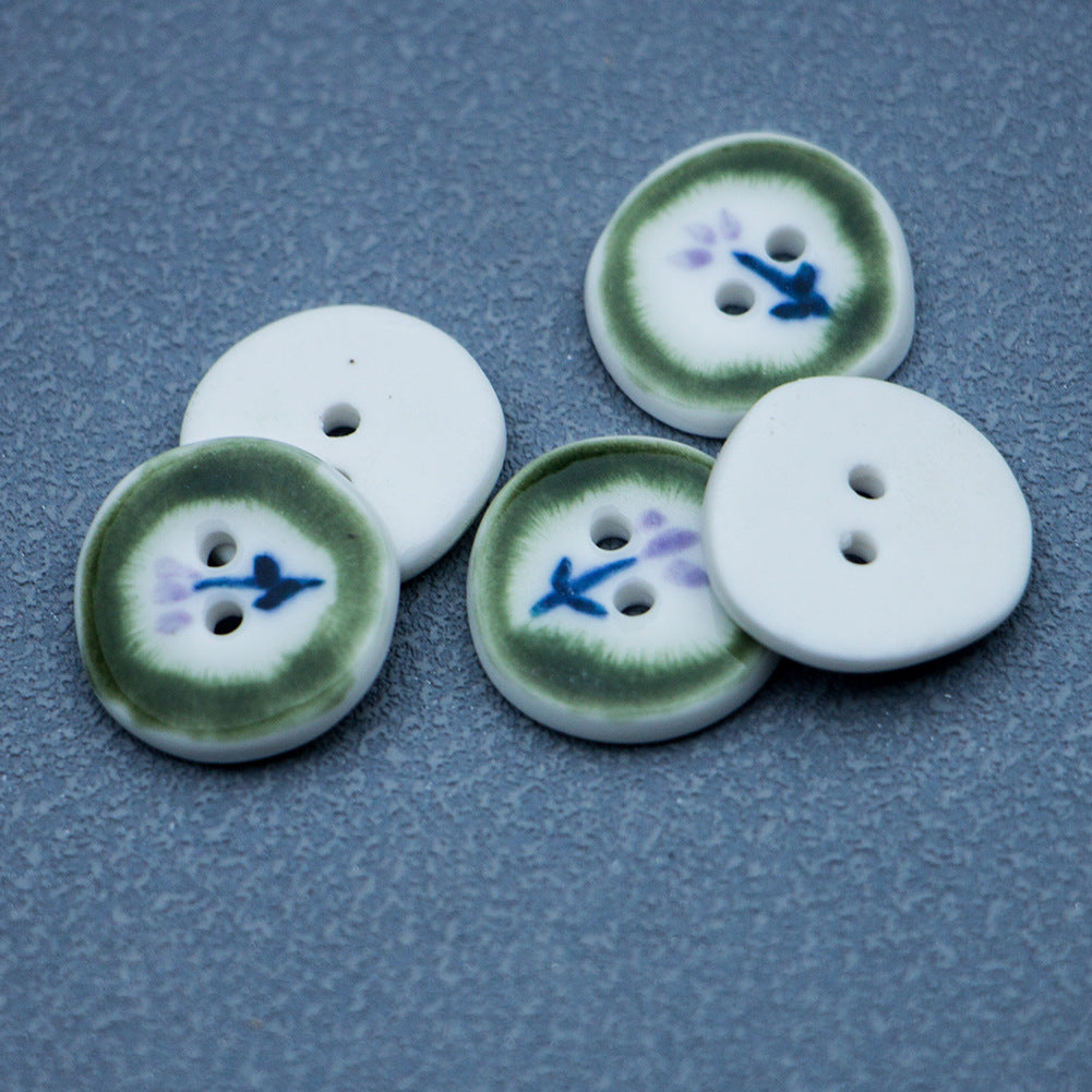 Ceramic buttons set: green front with blue/purple motif and white reverse backs with holes