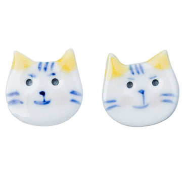 Blue and white cat ceramic button with yellow ears, pointed shape, front view