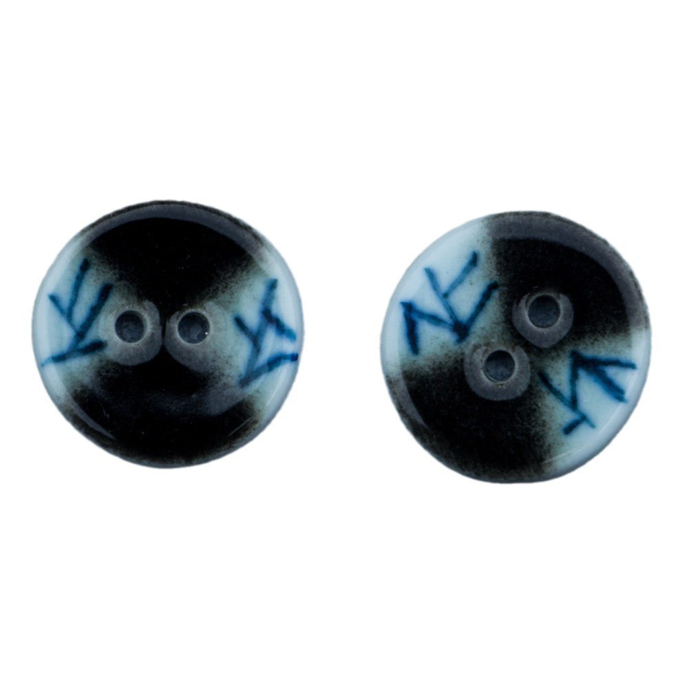Blue and white lattice ceramic buttons with black centers, two-hole style
