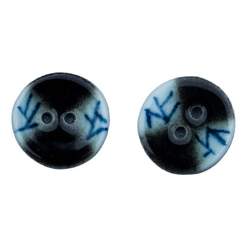 Blue and white lattice ceramic buttons with black centers, two-hole style