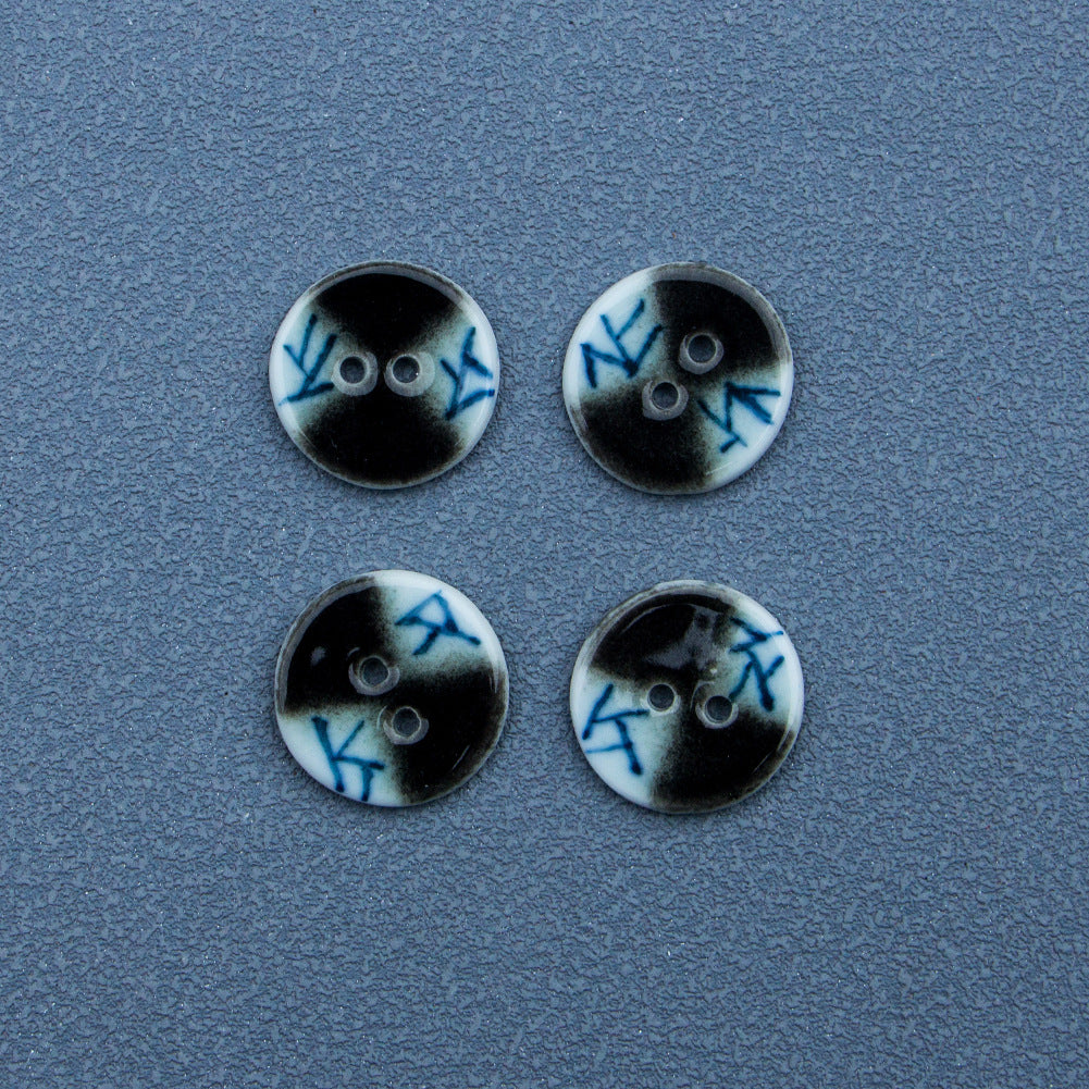 Four blue lattice ceramic buttons with dark faces and two-hole design