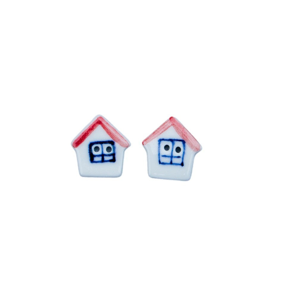 Pair of ceramic house buttons: white house, red roof, blue face