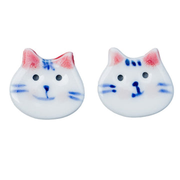 Cat ceramic button pair, white face with blue whiskers and red/pink ears