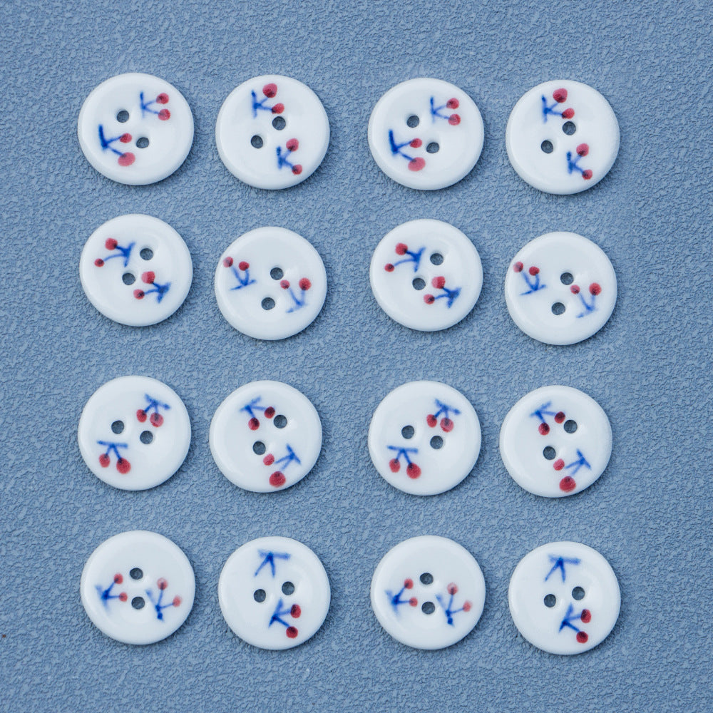 Round 2-hole ceramic buttons, white with red cherries and blue vine pattern, 6 pcs