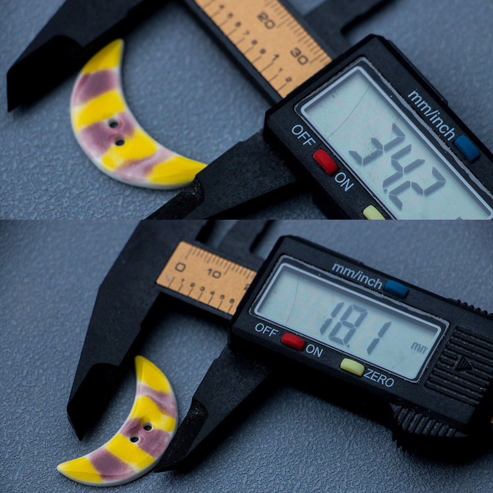 34mm crescent ceramic button with 2 holes, yellow and purple striped