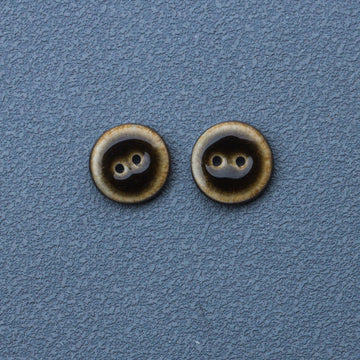 Dark brown glazed ceramic button, round, two-hole front view