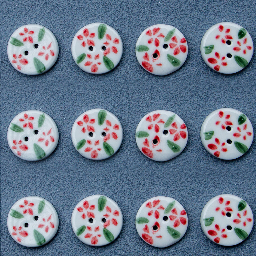 Round ceramic buttons, white with red flowers and green leaves, 2-hole, multiple pieces