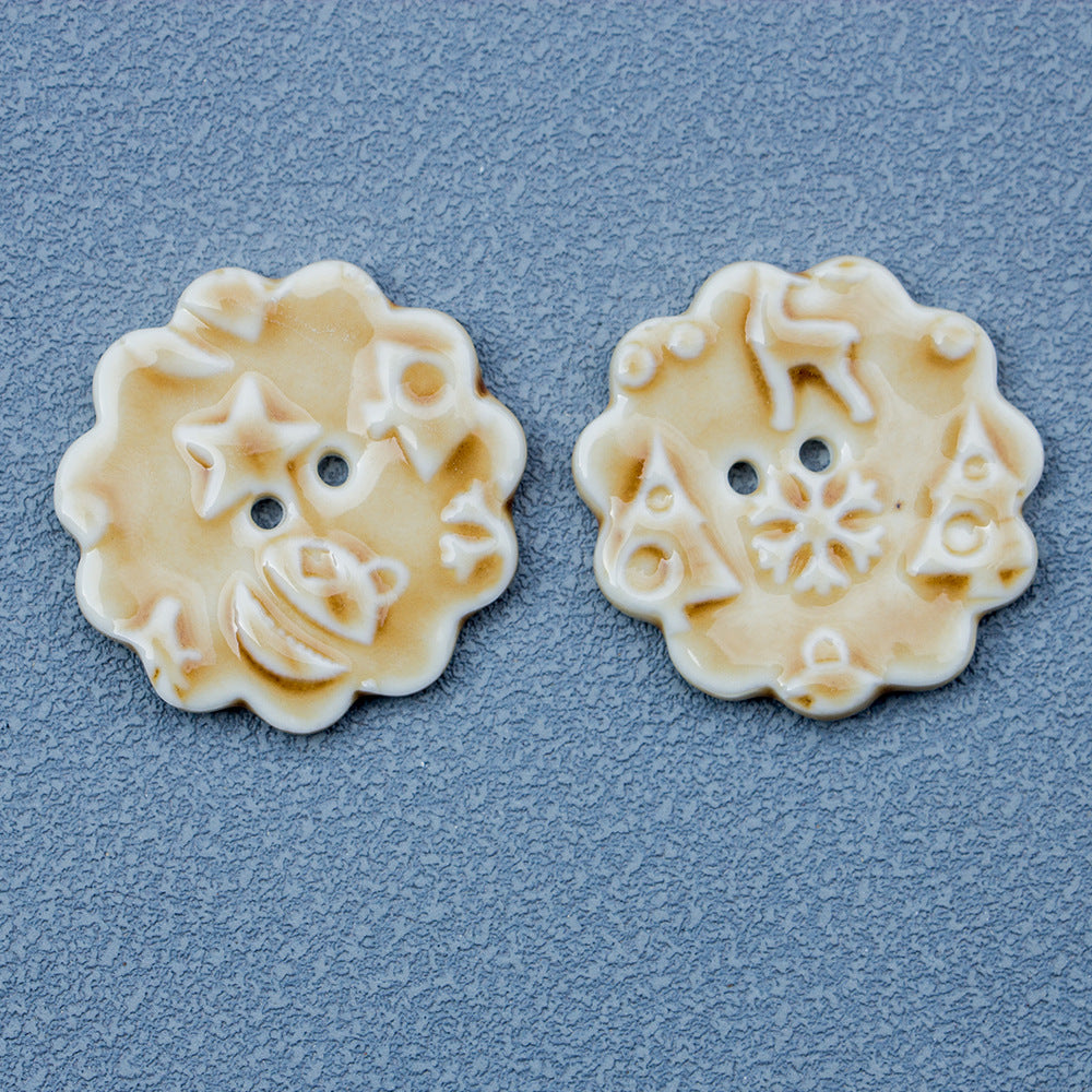 Round ceramic 2-hole buttons with snowflake elk motif in cream (2 pcs)