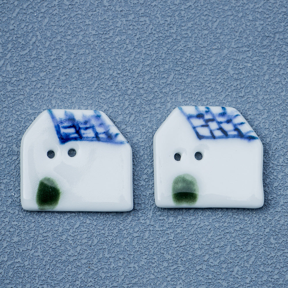 Ceramic house button, blue tiled roof, green dot, two-hole front