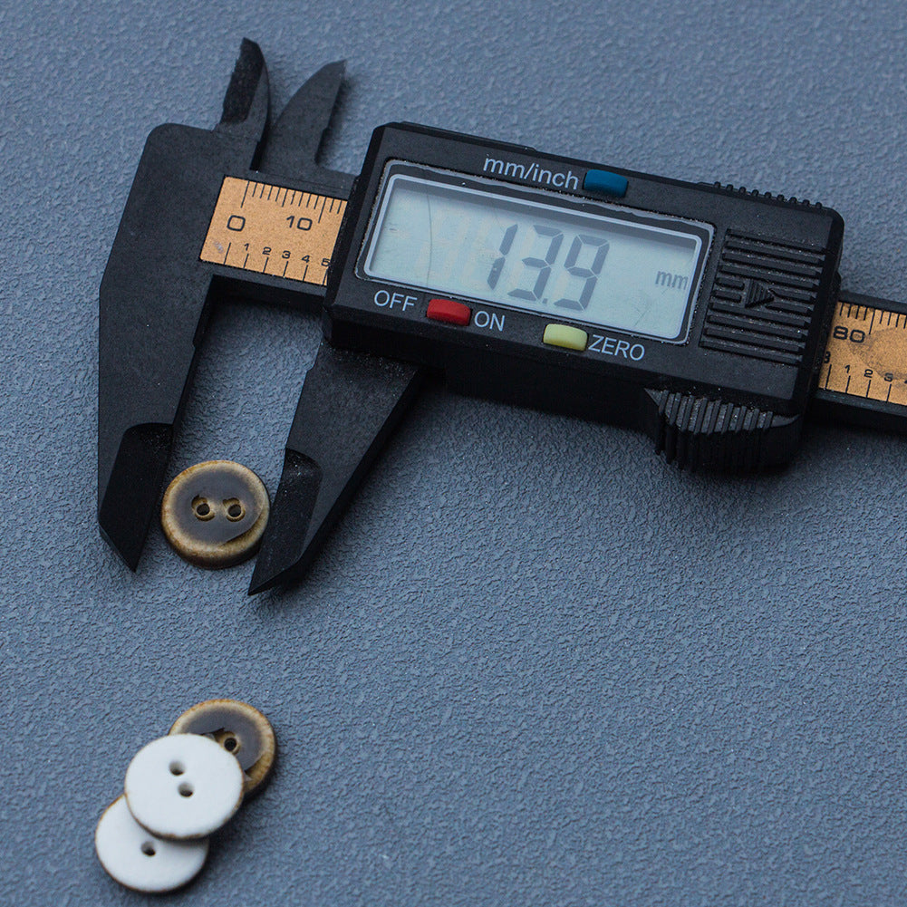 14mm round 2-hole glazed ceramic button, caliper size reference, dark bronze/brown finish