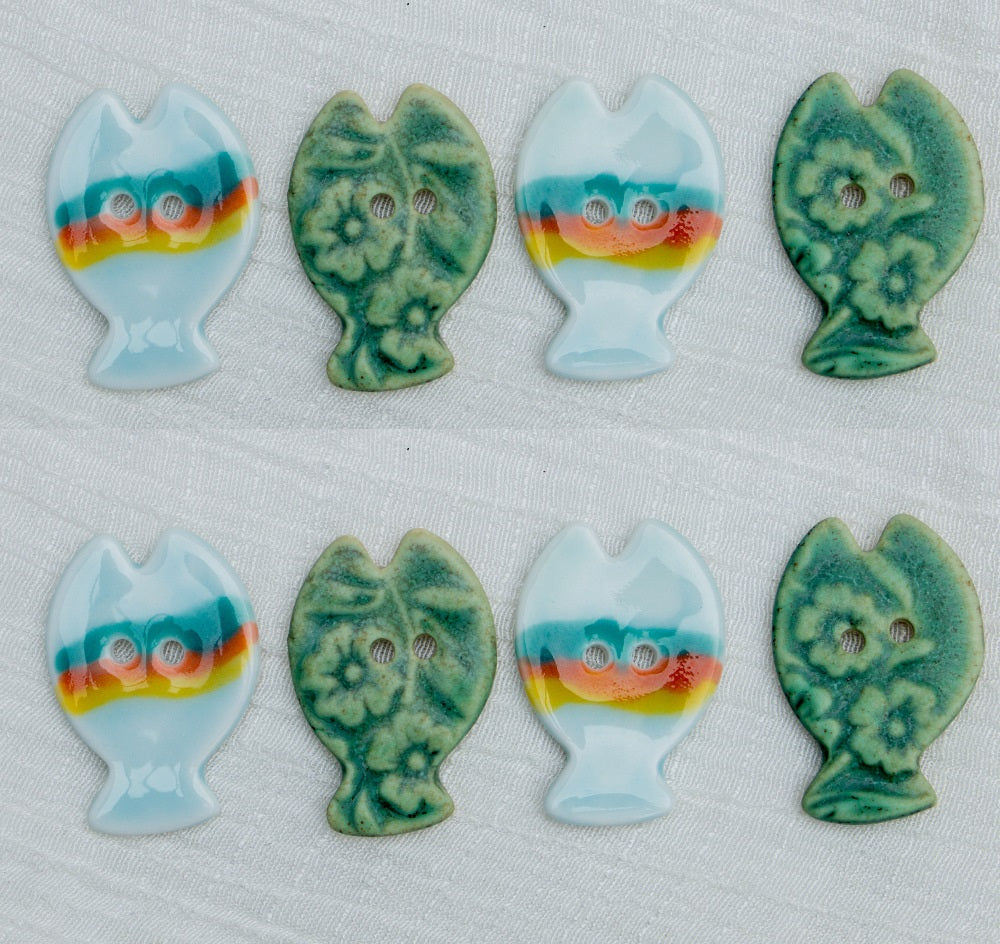 Hand-painted ceramic fish buttons with two holes, rainbow and bronze green mix
