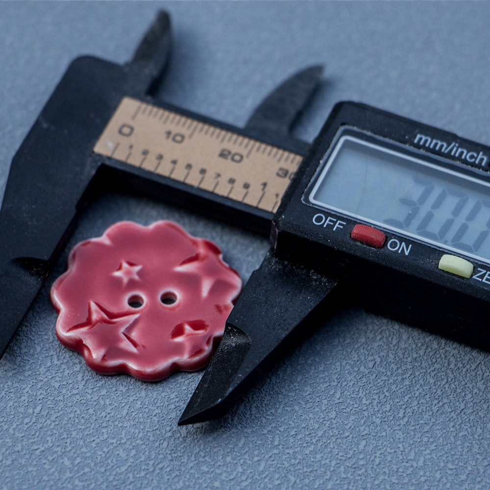 30mm red round ceramic button, star pattern with two holes