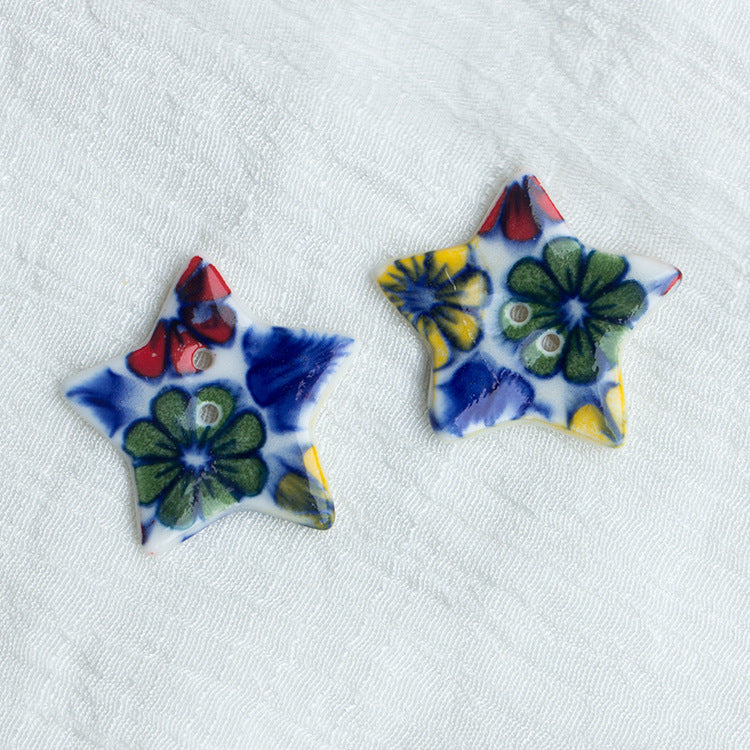 Ceramic star buttons with blue floral print, 2-hole (10pcs)