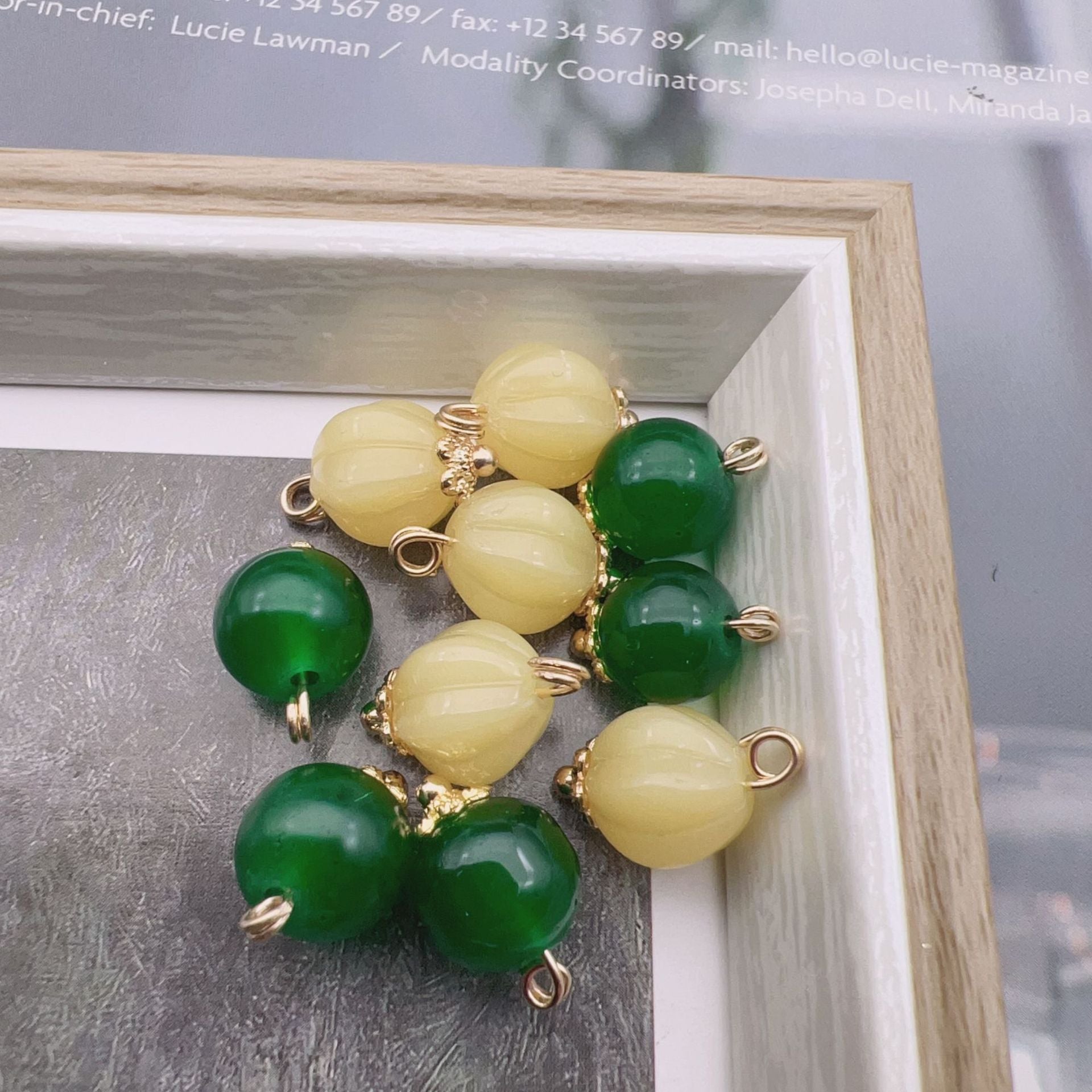 9mm glass bead buttons: yellow and dark-green round beads with gold-tone loops
