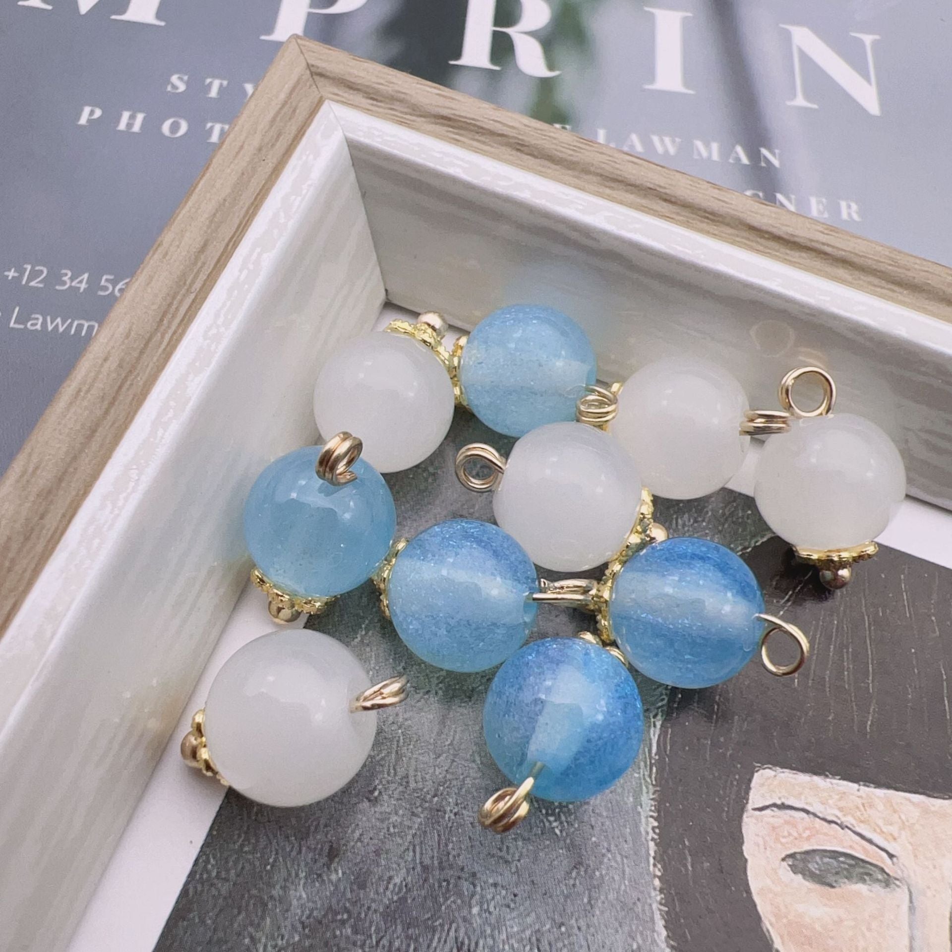 9mm glass bead buttons: white and light-blue round beads with gold-tone loops