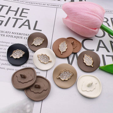 Assorted arched jeweled buttons with gold leaf trim; lacquered zinc alloy, 5 colors