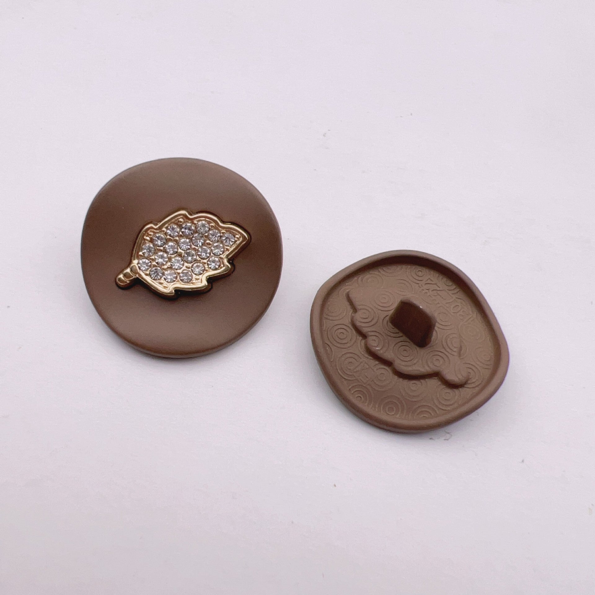 Coffee arched jeweled button with gold leaf trim and rhinestone leaf design
