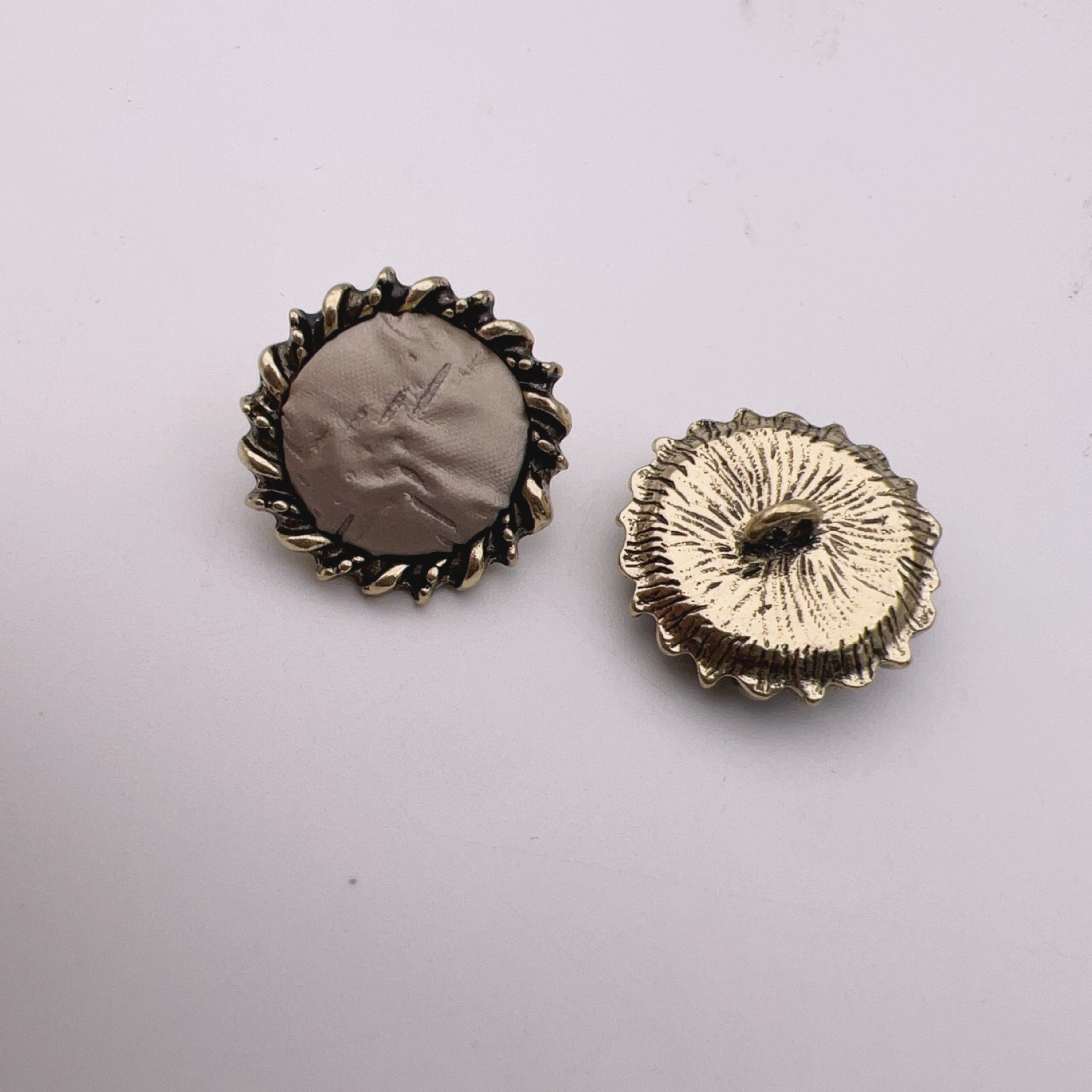 23mm leather buttons, coffee brown fabric center with antique bronze rim and cream sunburst