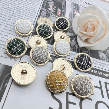 Gold-rimmed metal shank buttons set, “CHANGE” medallion, mixed black, gray, tan, white thread
