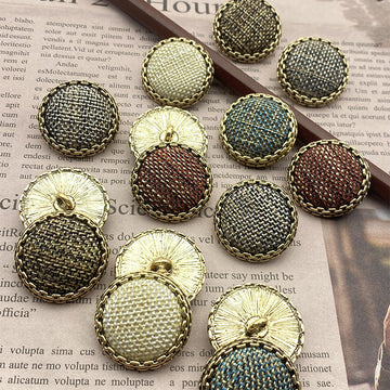 25mm metal shank button, brown woven fabric with gold rim and visible shank