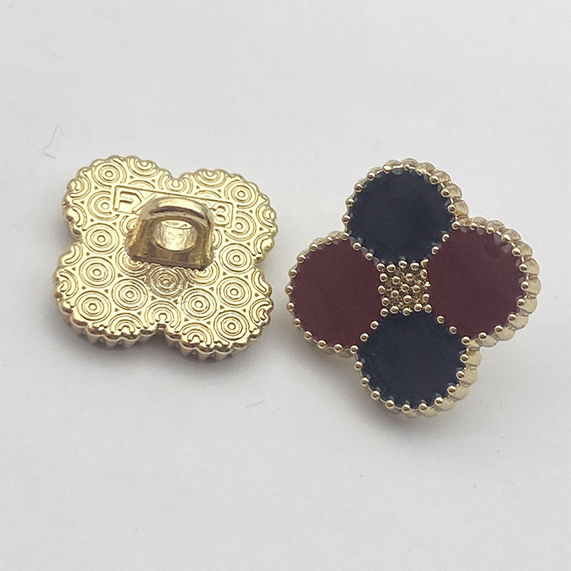 Four-leaf clover shank buttons: gold patterned back with navy, maroon and white bead trim